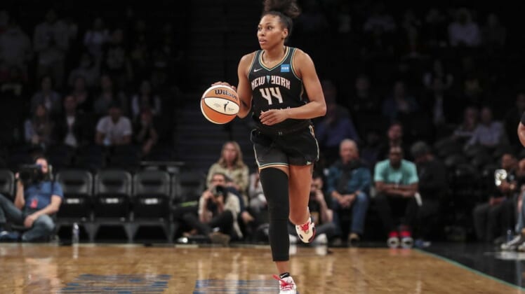 May 17, 2022; Brooklyn, New York, USA;  New York Liberty forward Betnijah Laney (44) brings the ball up court in the second quarter against the Connecticut Sun at Barclays Center. Mandatory Credit: Wendell Cruz-USA TODAY Sports