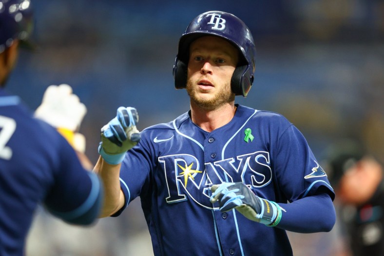May 17, 2022; St. Petersburg, Florida, USA;  Tampa Bay Rays right fielder Brett Phillips (35) crosses home plate after hitting a solo home run against the Detroit Tigers in the fifth inning at Tropicana Field. Mandatory Credit: Nathan Ray Seebeck-USA TODAY Sports