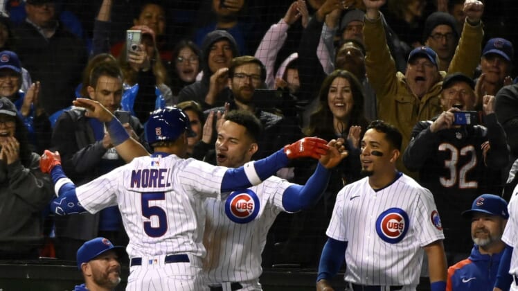May 17, 2022; Chicago, Illinois, USA;  Chicago Cubs Christopher Morel (5) greets catcher Willson Contreras (40) after hitting a solo home run against the Pittsburgh Pirates during the eighth inning at Wrigley Field. It was his first home run at his first at bat in the major leagues.  Mandatory Credit: Matt Marton-USA TODAY Sports