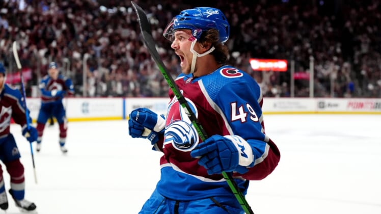 May 17, 2022; Denver, Colorado, USA; Colorado Avalanche defenseman Samuel Girard (49) reacts to his go ahead goal in the second period of game one of the second round of the 2022 Stanley Cup Playoffs against the St. Louis Blues at Ball Arena. Mandatory Credit: Ron Chenoy-USA TODAY Sports