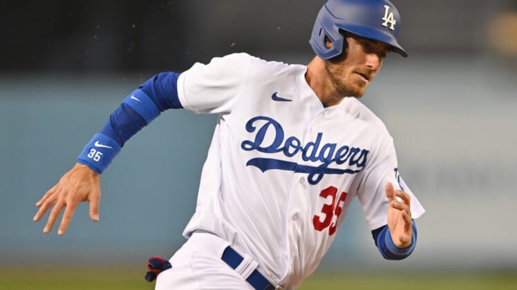 May 17, 2022; Los Angeles, California, USA;  Los Angeles Dodgers center fielder Cody Bellinger (35) scores on a double by second baseman Gavin Lux (9) in the second inning against the Arizona Diamondbacks at Dodger Stadium. Mandatory Credit: Jayne Kamin-Oncea-USA TODAY Sports