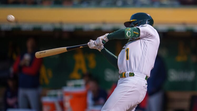 3May 17, 2022; Oakland, California, USA; Oakland Athletics third baseman Kevin Smith (1) hits a two run home run during the fourth inning against the Minnesota Twins at RingCentral Coliseum. Mandatory Credit: Neville E. Guard-USA TODAY Sports