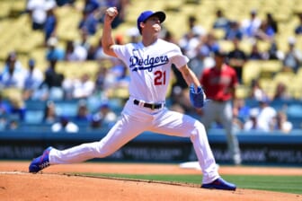 May 18, 2022; Los Angeles, California, USA; Los Angeles Dodgers starting pitcher Walker Buehler (21) throws against the Arizona Diamondbacks during the first inning at Dodger Stadium. Mandatory Credit: Gary A. Vasquez-USA TODAY Sports