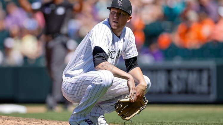 May 18, 2022; Denver, Colorado, USA; Colorado Rockies starting pitcher Kyle Freeland (21) looks on after a field attendant interfered with a live ball in the sixth inning against the San Francisco Giants at Coors Field. Mandatory Credit: Isaiah J. Downing-USA TODAY Sports