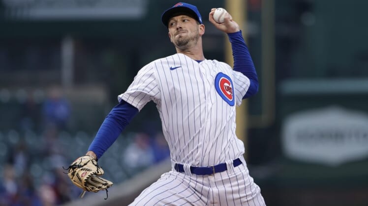 May 18, 2022; Chicago, Illinois, USA; Chicago Cubs starting pitcher Drew Smyly (11) delivers against the Pittsburgh Pirates during the first inning at Wrigley Field. Mandatory Credit: Kamil Krzaczynski-USA TODAY Sports