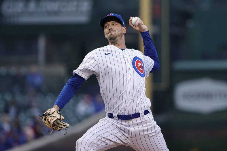 May 18, 2022; Chicago, Illinois, USA; Chicago Cubs starting pitcher Drew Smyly (11) delivers against the Pittsburgh Pirates during the first inning at Wrigley Field. Mandatory Credit: Kamil Krzaczynski-USA TODAY Sports
