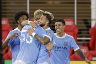 May 18, 2022; Washington, District of Columbia, USA; New York City FC midfielder Valent n Castellanos (11) celebrates with teammates after scoring a goal on a penalty kick against D.C. United in the first half at Audi Field. Mandatory Credit: Geoff Burke-USA TODAY Sports