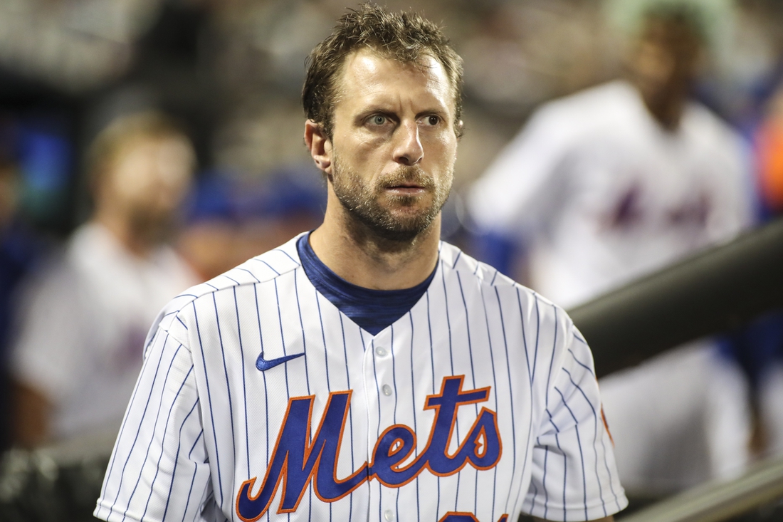 May 18, 2022; New York City, New York, USA; New York Mets starting pitcher Max Scherzer (21) looks out from the dugout in the fifth inning against the St. Louis Cardinals at Citi Field. Mandatory Credit: Wendell Cruz-USA TODAY Sports