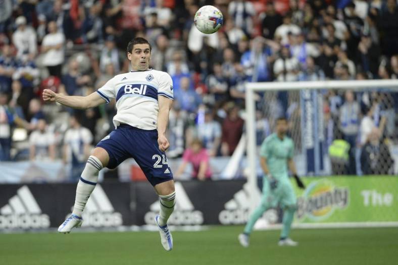 May 18, 2022; Vancouver, British Columbia, CAN;  Vancouver Whitecaps forward Brian White (24) goes up for a header against the FC Dallas during the second half at BC Place. Mandatory Credit: Anne-Marie Sorvin-USA TODAY Sports