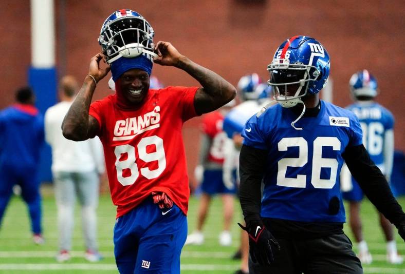 New York Giants wide receiver Kadarius Toney (89) and running back Saquon Barkley (26) on the field for organized team activities (OTAs) at the training center in East Rutherford on Thursday, May 19, 2022.

Nfl Ny Giants Practice
