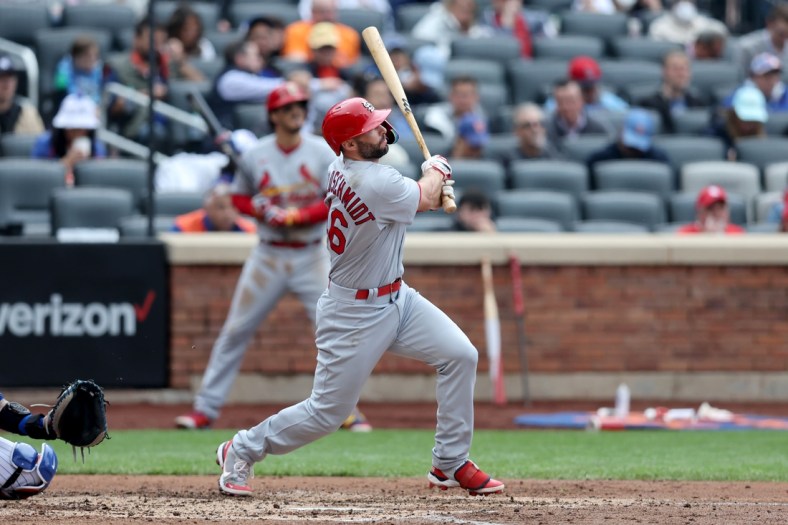 May 19, 2022; New York City, New York, USA; St. Louis Cardinals designated hitter Paul Goldschmidt (46) follows through on a solo home run against the New York Mets during the third inning at Citi Field. Mandatory Credit: Brad Penner-USA TODAY Sports