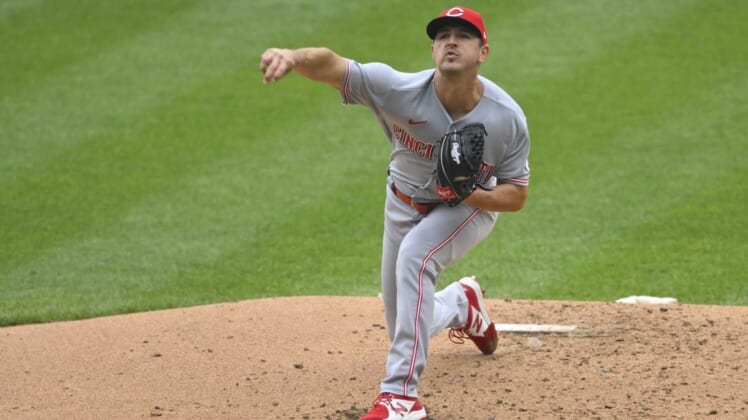 May 19, 2022; Cleveland, Ohio, USA; Cincinnati Reds starting pitcher Tyler Mahle (30) delivers a pitch in the second inning against the Cleveland Guardians at Progressive Field. Mandatory Credit: David Richard-USA TODAY Sports