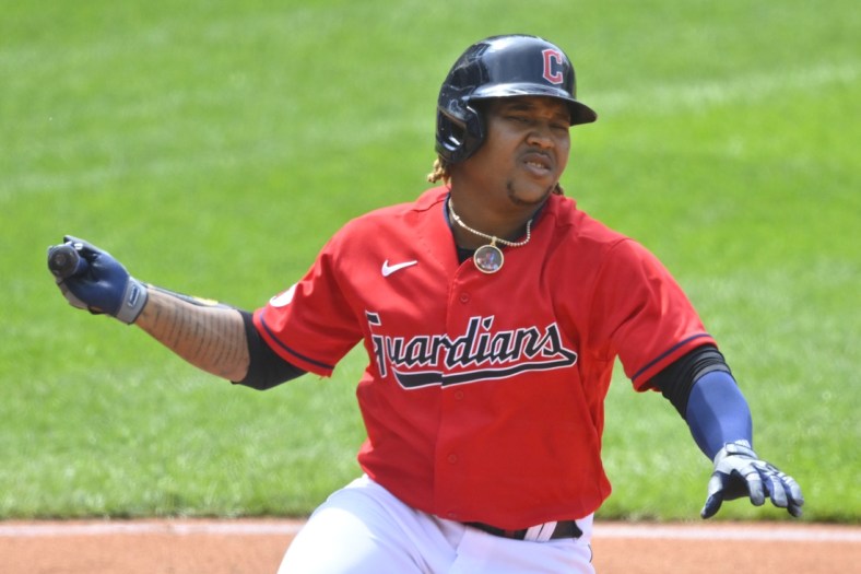May 19, 2022; Cleveland, Ohio, USA; Cleveland Guardians third baseman Jose Ramirez (11) reacts after he was hit with a foul ball in the eighth inning against the Cincinnati Reds at Progressive Field. Mandatory Credit: David Richard-USA TODAY Sports