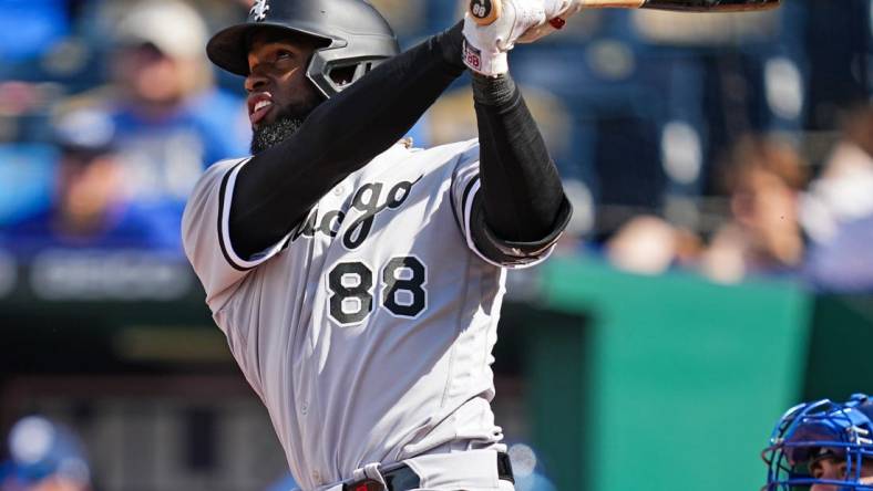 May 19, 2022; Kansas City, Missouri, USA; Chicago White Sox center fielder Luis Robert (88) hits a home run during the eighth inning against the Kansas City Royals at Kauffman Stadium. Mandatory Credit: Jay Biggerstaff-USA TODAY Sports