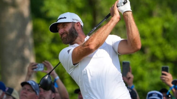 May 19, 2022; Tulsa, OK, USA;  Dustin Johnson plays a shot on the 13th tee during the first round of the PGA Championship golf tournament at Southern Hills Country Club. Mandatory Credit: Michael Madrid-USA TODAY Sports