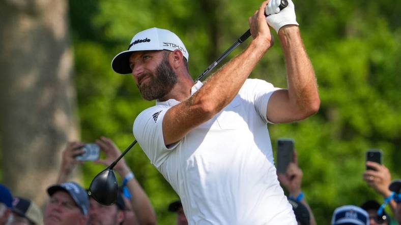 May 19, 2022; Tulsa, OK, USA;  Dustin Johnson plays a shot on the 13th tee during the first round of the PGA Championship golf tournament at Southern Hills Country Club. Mandatory Credit: Michael Madrid-USA TODAY Sports