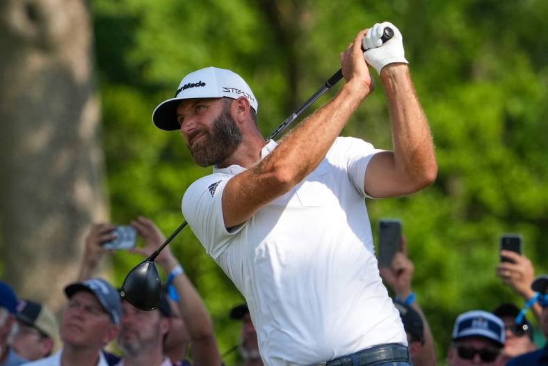 May 19, 2022; Tulsa, OK, USA;  Dustin Johnson plays a shot on the 13th tee during the first round of the PGA Championship golf tournament at Southern Hills Country Club. Mandatory Credit: Michael Madrid-USA TODAY Sports