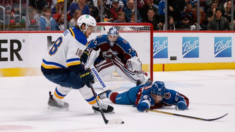 May 19, 2022; Denver, Colorado, USA; Colorado Avalanche goaltender Darcy Kuemper (35) looks on as left wing Artturi Lehkonen (62) defends against St. Louis Blues center Robert Thomas (18) in the second period in game two of the second round of the 2022 Stanley Cup Playoffs at Ball Arena. Mandatory Credit: Isaiah J. Downing-USA TODAY Sports