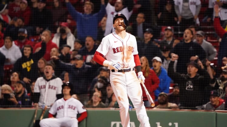 May 19, 2022; Boston, Massachusetts, USA; Boston Red Sox second baseman Trevor Story (10) hits a three run home run against the Seattle Mariners in the eighth inning at Fenway Park. Mandatory Credit: David Butler II-USA TODAY Sports