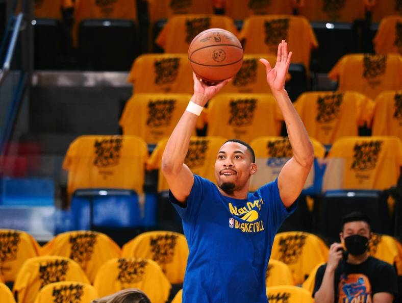 May 20, 2022; San Francisco, California, USA; Golden State Warriors forward Otto Porter Jr. (32) warms up before game two of the 2022 western conference finals against the Dallas Mavericks at Chase Center. Mandatory Credit: Kelley L Cox-USA TODAY Sports