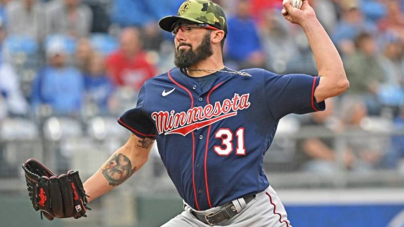 May 20, 2022; Kansas City, Missouri, USA; Minnesota Twins starting pitcher Devin Smeltzer (31) delivers a pitch during the first inning against the Kansas City Royals at Kauffman Stadium. Mandatory Credit: Peter Aiken-USA TODAY Sports