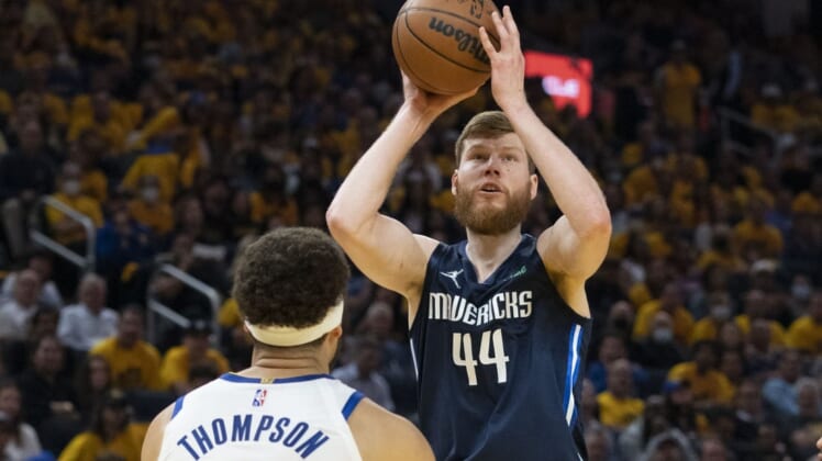 May 20, 2022; San Francisco, California, USA; Dallas Mavericks forward Davis Bertans (44) shoots the basketball against Golden State Warriors guard Klay Thompson (11) during the second quarter in game two of the 2022 western conference finals at Chase Center. Mandatory Credit: Kyle Terada-USA TODAY Sports