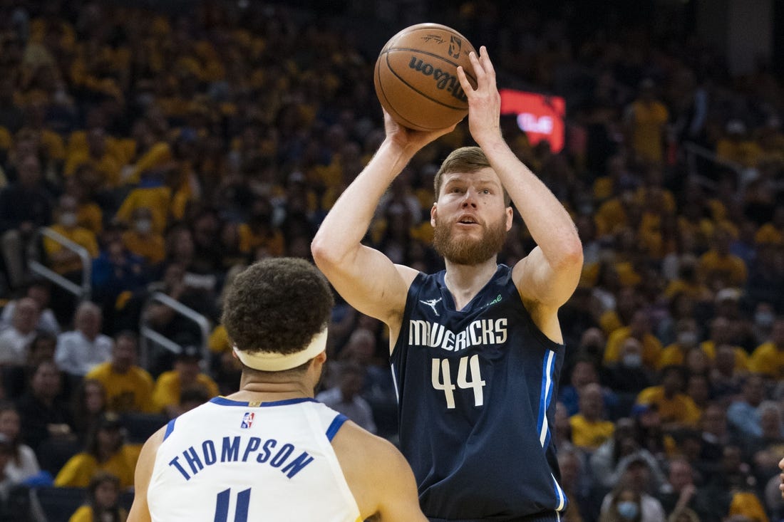 May 20, 2022; San Francisco, California, USA; Dallas Mavericks forward Davis Bertans (44) shoots the basketball against Golden State Warriors guard Klay Thompson (11) during the second quarter in game two of the 2022 western conference finals at Chase Center. Mandatory Credit: Kyle Terada-USA TODAY Sports