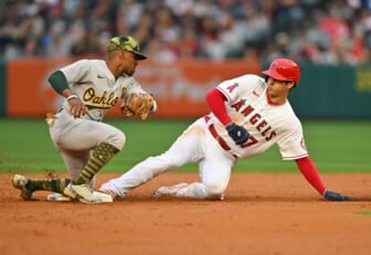 May 20, 2022; Anaheim, California, USA;  Los Angeles Angels designated hitter Shohei Ohtani (17) beats the tag by Oakland Athletics second baseman Tony Kemp (5) for a stolen base in the first inning of the game at Angel Stadium. Mandatory Credit: Jayne Kamin-Oncea-USA TODAY Sports