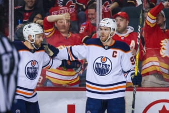 May 20, 2022; Calgary, Alberta, CAN; Edmonton Oilers center Connor McDavid (97) celebrates his goal with Edmonton Oilers center Leon Draisaitl (29) during the second period against the Calgary Flames in game two of the second round of the 2022 Stanley Cup Playoffs at Scotiabank Saddledome. Mandatory Credit: Sergei Belski-USA TODAY Sports