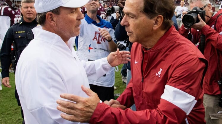 Texas A&M head coach Jimbo Fisher, left, and Alabama head coach Nick Saban meet at midfield after their game in College Station, Texas, in 2019.Xxx Img Bama667 1 1 45v20bgg Jpg