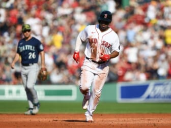 May 21, 2022; Boston, Massachusetts, USA;  Boston Red Sox third baseman Rafael Devers (11) runs the bases after hitting a solo home run against the Seattle Mariners during the third inning at Fenway Park. Mandatory Credit: Brian Fluharty-USA TODAY Sports