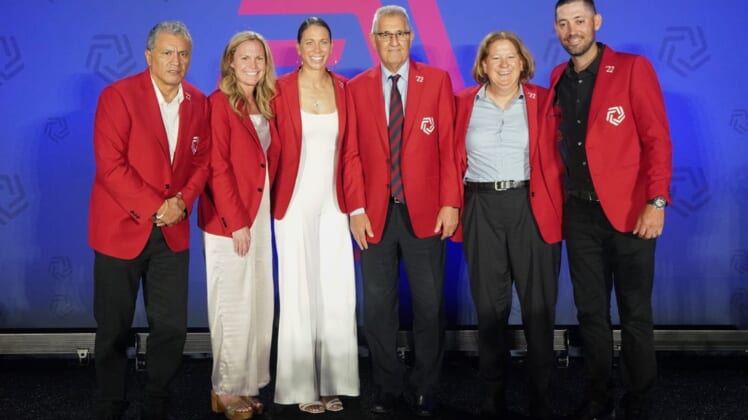 May 21, 2022; Frisco, Texas, USA; Marco Etcheverry, Christie Pearce Rampone, Shannon Boxx, Esse Baharmast, Linda Hamilton, and Clint Dempsey pose during the National Soccer Hall of Fame Class of 2022 Induction Ceremony at Toyota Stadium. Mandatory Credit: Chris Jones-USA TODAY Sports