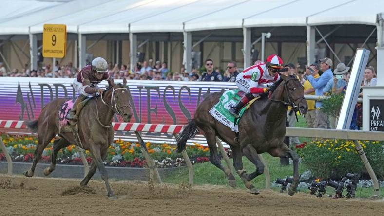 May 21, 2022; Baltimore, MD, USA; Early Voting with jockey Jose Ortiz wins the Preakness Stakes ahead of Epicenter (left) at Pimlico Race Course. Mandatory Credit: Mitch Stringer-USA TODAY Sports