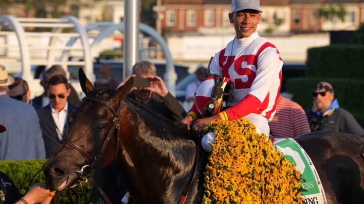 May 21, 2022; Baltimore, MD, USA; Early Voting jockey Jose Ortiz aboard in the winners circle after the Preakness Stakes at Pimlico Race Course. Mandatory Credit: Mitch Stringer-USA TODAY Sports