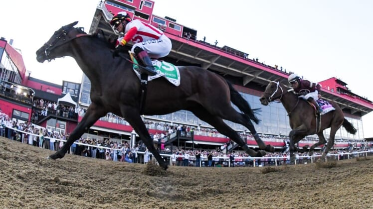 May 21, 2022; Baltimore, MD, USA;  Jose L Ortiz aboard Early Voting  wins the running of the 147 Preakness Stakes at Pimlico Race Course. Mandatory Credit: Tommy Gilligan-USA TODAY Sports