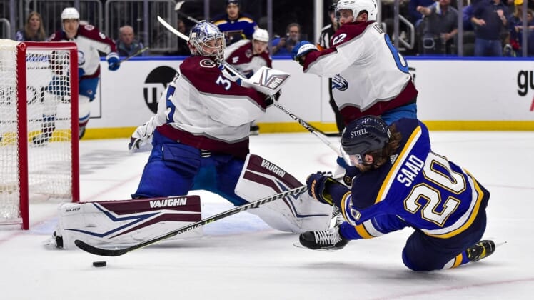 May 21, 2022; St. Louis, Missouri, USA; Colorado Avalanche goaltender Darcy Kuemper (35) defends the net against St. Louis Blues left wing Brandon Saad (20) during the second period in game three of the second round of the 2022 Stanley Cup Playoffs at Enterprise Center. Mandatory Credit: Jeff Curry-USA TODAY Sports