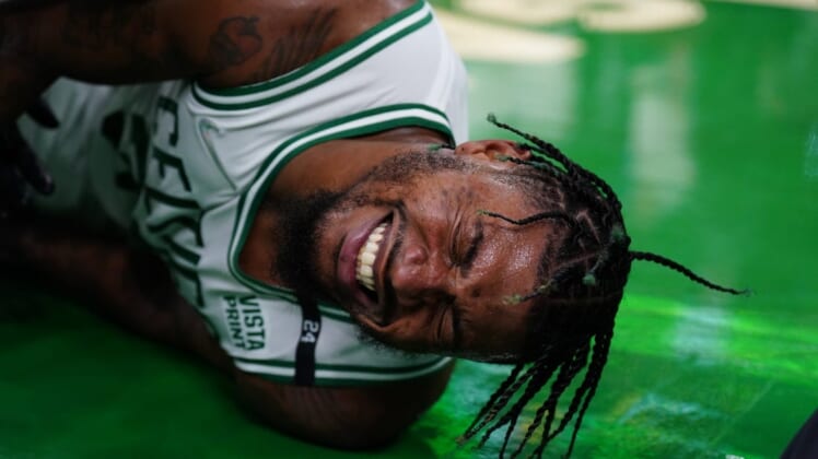 May 21, 2022; Boston, Massachusetts, USA; Boston Celtics guard Marcus Smart (36) reacts after suffering an apparent injury to his ankle against the Miami Heat n the third quarter during game three of the 2022 eastern conference finals at TD Garden. Mandatory Credit: David Butler II-USA TODAY Sports
