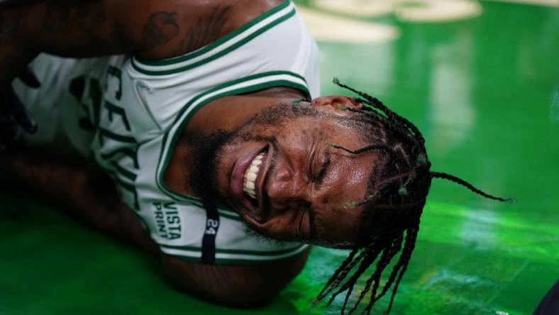 May 21, 2022; Boston, Massachusetts, USA; Boston Celtics guard Marcus Smart (36) reacts after suffering an apparent injury to his ankle against the Miami Heat n the third quarter during game three of the 2022 eastern conference finals at TD Garden. Mandatory Credit: David Butler II-USA TODAY Sports