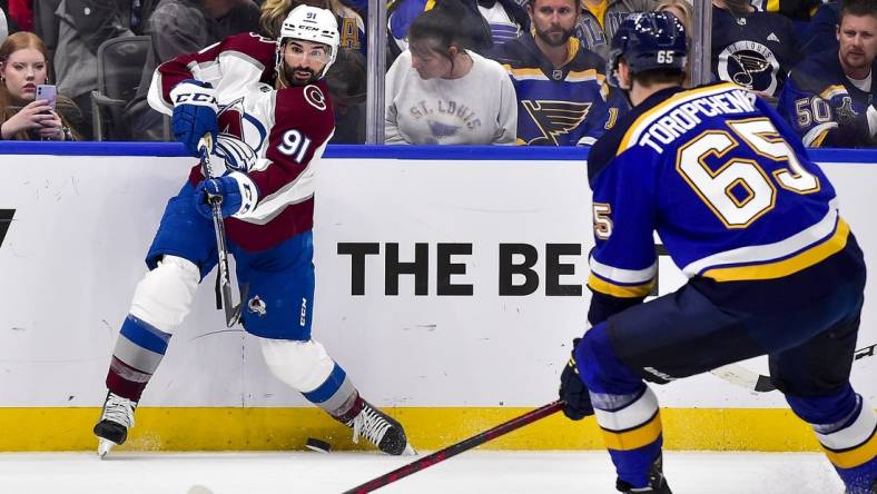 May 21, 2022; St. Louis, Missouri, USA; Colorado Avalanche center Nazem Kadri (91) shoots against the St. Louis Blues during the third period in game three of the second round of the 2022 Stanley Cup Playoffs at Enterprise Center. Mandatory Credit: Jeff Curry-USA TODAY Sports