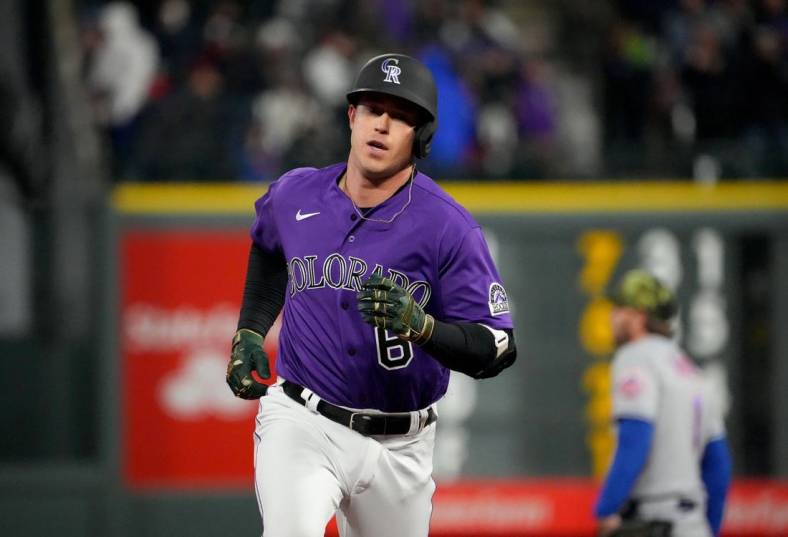 May 21, 2022; Denver, Colorado, USA; Colorado Rockies catcher Brian Serven (6) runs after hitting a two run home run against the New York Mets in the sixth inning at Coors Field. Mandatory Credit: Ron Chenoy-USA TODAY Sports