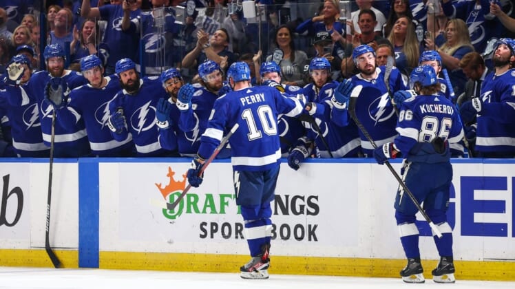 May 22, 2022; Tampa, Florida, USA; Tampa Bay Lightning right wing Corey Perry (10) (center) celebrates after scoring a goal against the Florida Panthers in the first period in game three of the second round of the 2022 Stanley Cup Playoffs at Amalie Arena. Mandatory Credit: Nathan Ray Seebeck-USA TODAY Sports