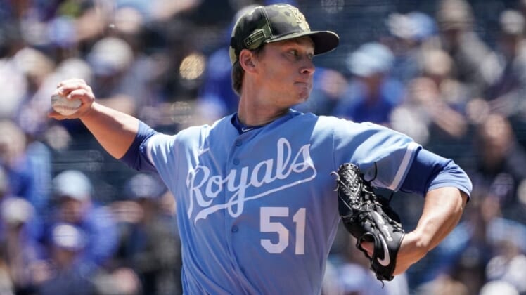 May 22, 2022; Kansas City, Missouri, USA; Kansas City Royals starting pitcher Brady Singer (51) delivers a pitch against the Minnesota Twins in the first inning at Kauffman Stadium. Mandatory Credit: Denny Medley-USA TODAY Sports