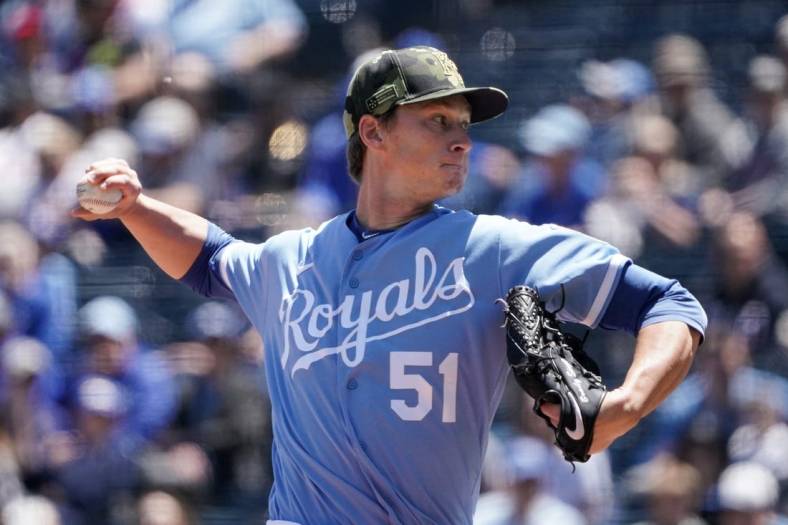 May 22, 2022; Kansas City, Missouri, USA; Kansas City Royals starting pitcher Brady Singer (51) delivers a pitch against the Minnesota Twins in the first inning at Kauffman Stadium. Mandatory Credit: Denny Medley-USA TODAY Sports