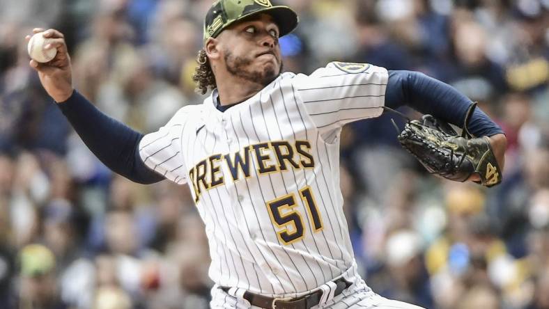 May 22, 2022; Milwaukee, Wisconsin, USA; Milwaukee Brewers pitcher Freddy Peralta (51) throws a pitch in the third inning against the Washington Nationals at American Family Field. Mandatory Credit: Benny Sieu-USA TODAY Sports