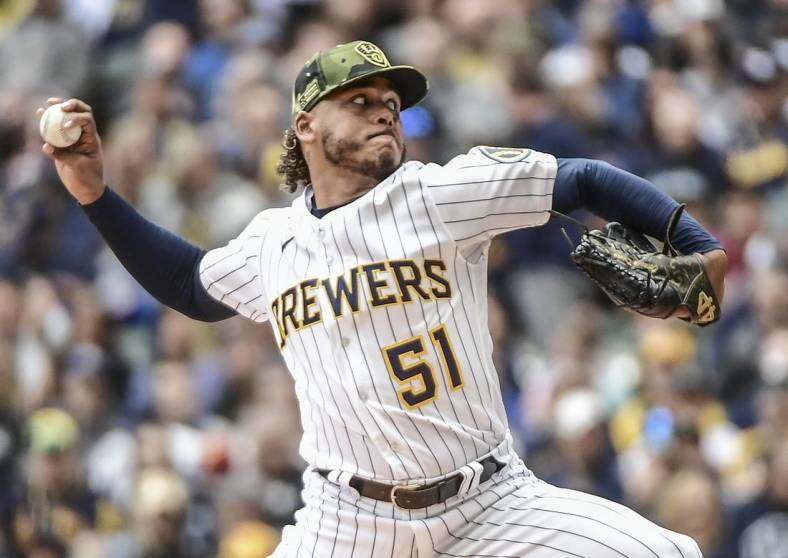 May 22, 2022; Milwaukee, Wisconsin, USA; Milwaukee Brewers pitcher Freddy Peralta (51) throws a pitch in the third inning against the Washington Nationals at American Family Field. Mandatory Credit: Benny Sieu-USA TODAY Sports