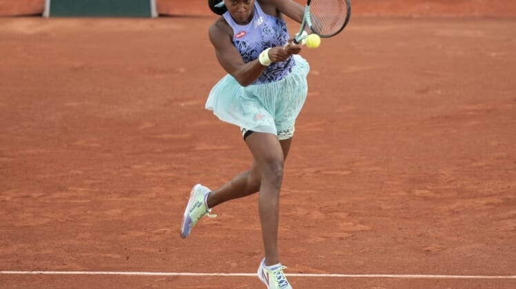 May 22, 2022; Paris, France;  Coco Gauff (USA) returns the ball during her match against Rebecca Marino (CAN) on day one of the French Open at Stade Roland-Garros. Mandatory Credit: Susan Mullane-USA TODAY Sports
