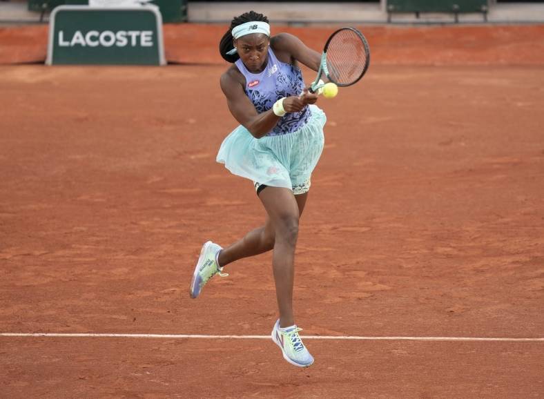 May 22, 2022; Paris, France;  Coco Gauff (USA) returns the ball during her match against Rebecca Marino (CAN) on day one of the French Open at Stade Roland-Garros. Mandatory Credit: Susan Mullane-USA TODAY Sports