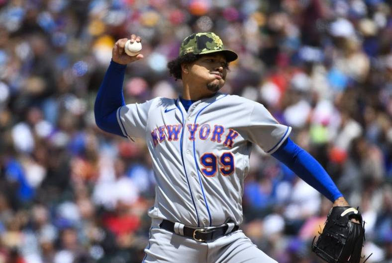 May 22, 2022; Denver, Colorado, USA; New York Mets starting pitcher Taijuan Walker (99) delivers pitch in the fifth inning against the Colorado Rockies at Coors Field. Mandatory Credit: John Leyba-USA TODAY Sports