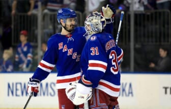 May 22, 2022; New York, New York, USA; New York Rangers left wing Chris Kreider (20) celebrates a 3-1 win against the Carolina Hurricanes with New York Rangers goalie Igor Shesterkin (31) in game three of the second round of the 2022 Stanley Cup Playoffs at Madison Square Garden. Mandatory Credit: Danny Wild-USA TODAY Sports