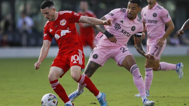 May 22, 2022; Fort Lauderdale, Florida, USA; New York Red Bulls midfielder Lewis Morgan (10) protects the ball from Inter Miami CF midfielder Gregore (26) during the first half at DRV PNK Stadium. Mandatory Credit: Sam Navarro-USA TODAY Sports